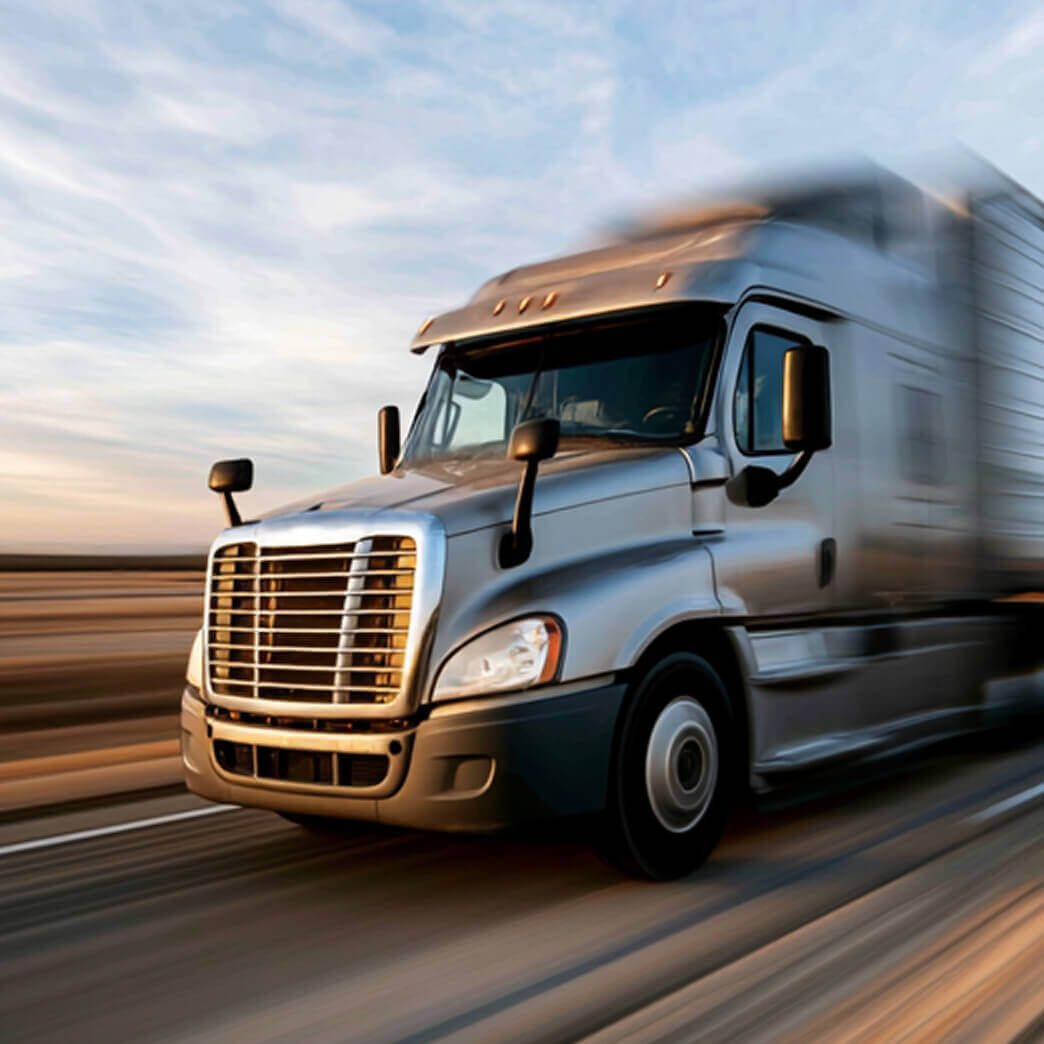 Semi truck delivering parts on the highway