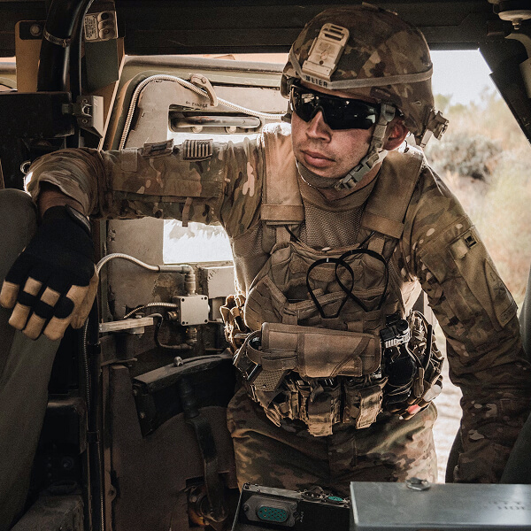 Soldier in a military vehicle